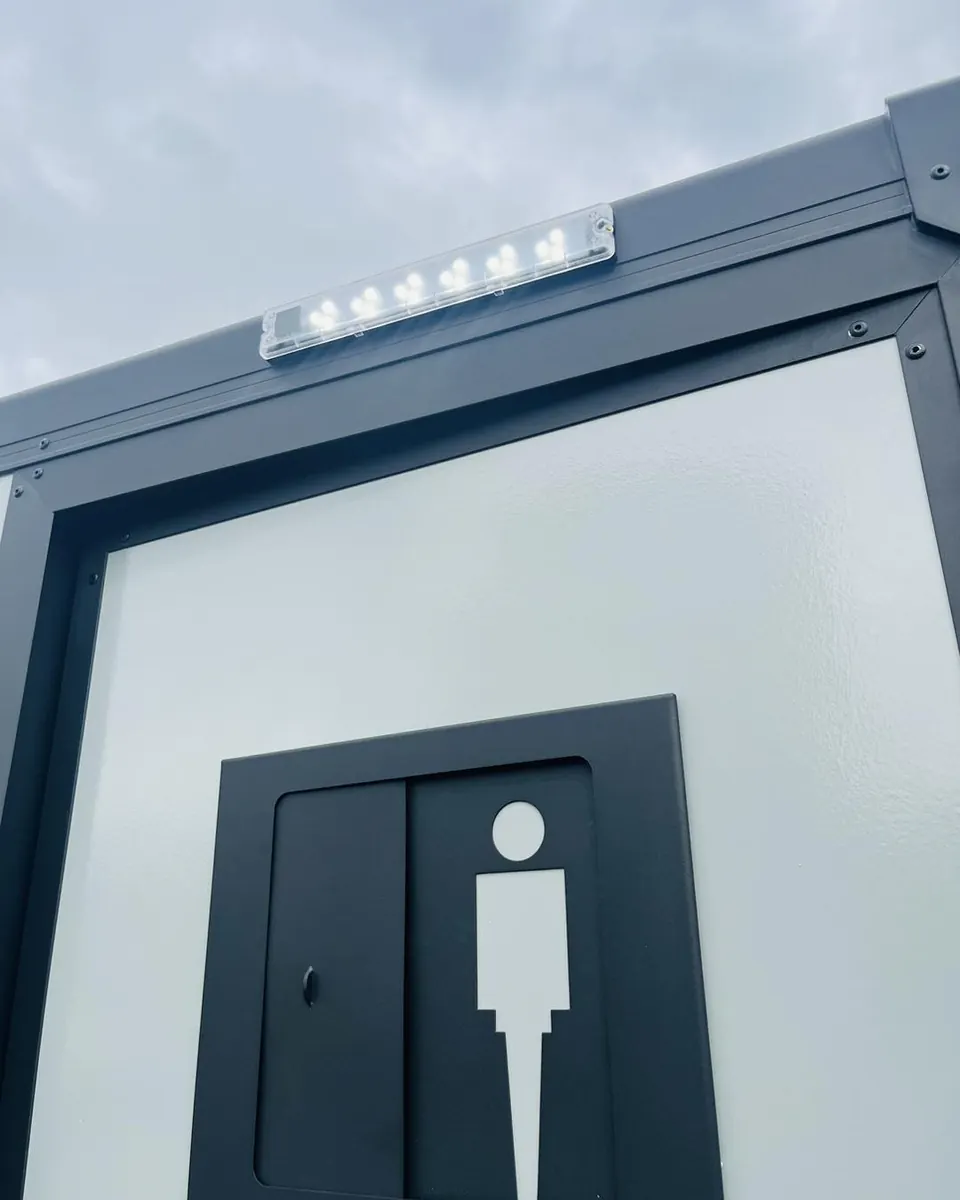 Restroom trailer exterior and entrance door