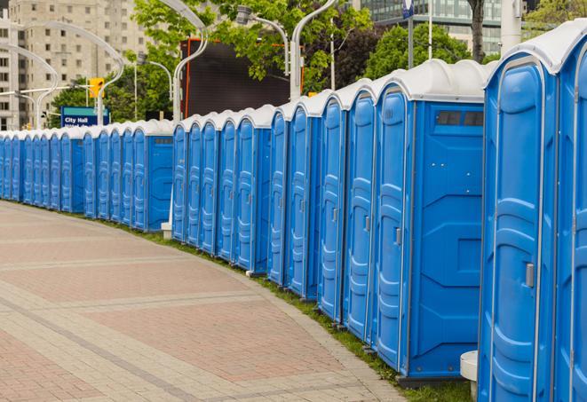 a row of portable restrooms at a fairground, offering visitors a clean and hassle-free experience in glendora